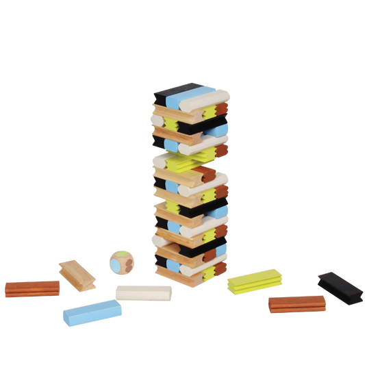 A variety of wooden blocks in different colors toppled over each other, with some positioned upright and a few lying on the ground. There is also a small wooden cube and a die visible in the image.