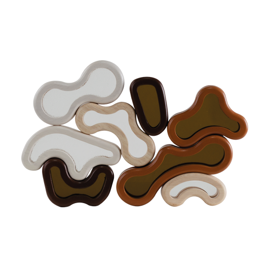 A set of multicolored organic acrylic blocks of various shapes placed on a white background.