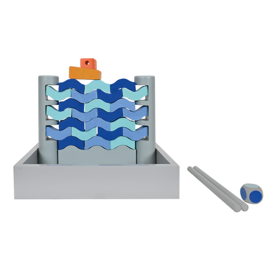 A toy wobbling wall game consisting of a metal frame with a series of blue and gray bricks, and a die with one orange and one blue marker.