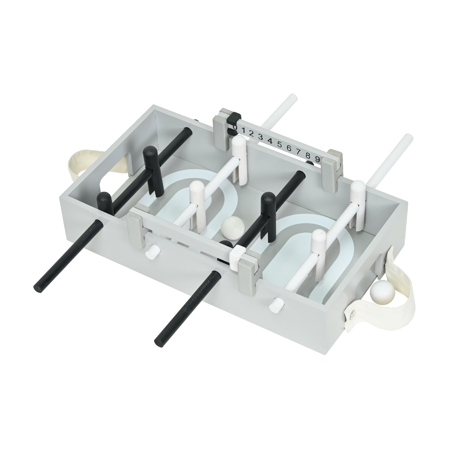 A table football set with a gray playing surface, black and white players, and balls.