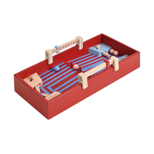 A red pinball machine with a soccer ball and goals, designed for young children.