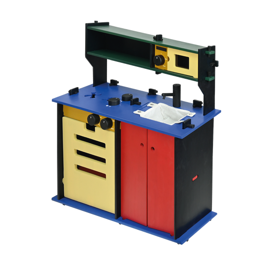 A colorful toy kitchen with a stove top, oven, sink, and microwave. The kitchen has a blue countertop with a yellow oven, black stove top, red drawers, and a green microwave on top.