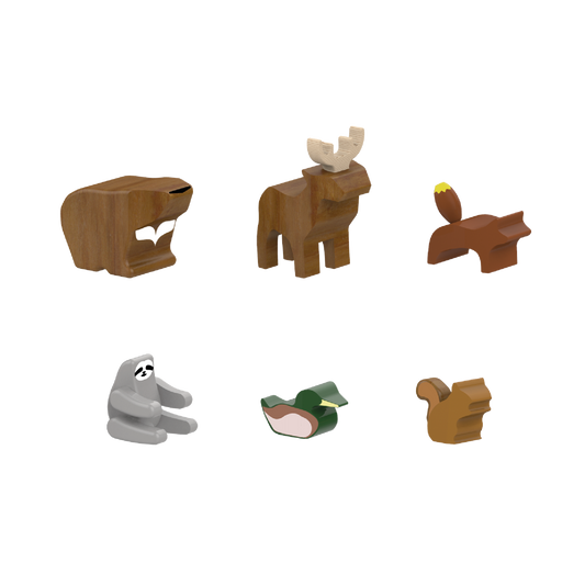 A collection of wooden animal figures including a bear, deer, fox, squirrel, sloth, and a duck.