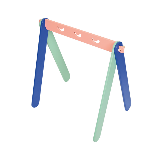 A colorful A-frame mobile hanger with a pink, blue, and green dowel construction designed for baby play areas.
