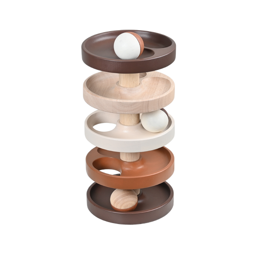 Stack of wooden bowls with different colors on a white background