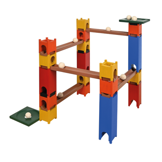 A colorful spiral marble run set with various curved tracks and interlocking blocks in red, blue, yellow, and green, designed for young children.