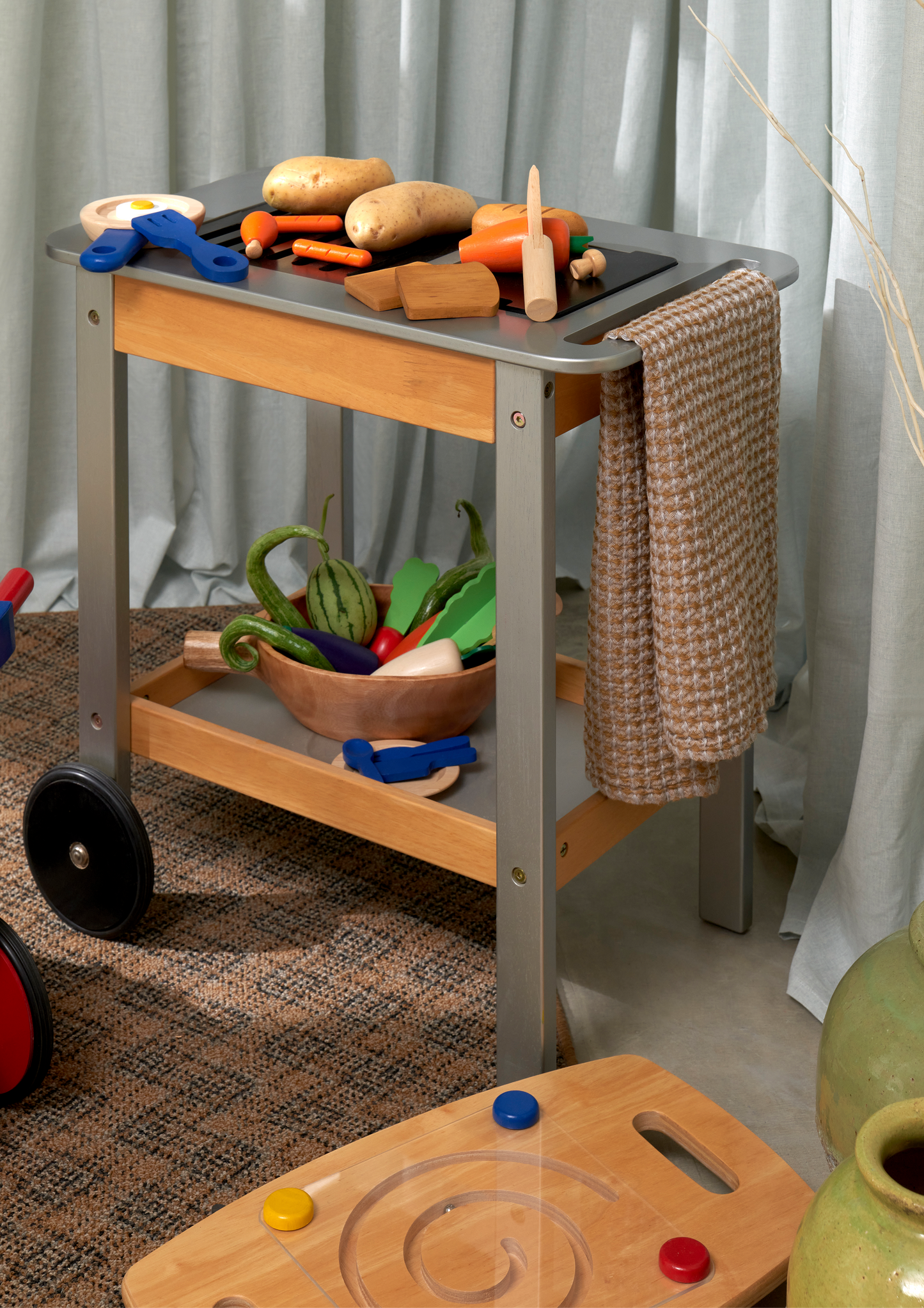 Wooden toy crate with fish, meat, sausages, and chicken legs