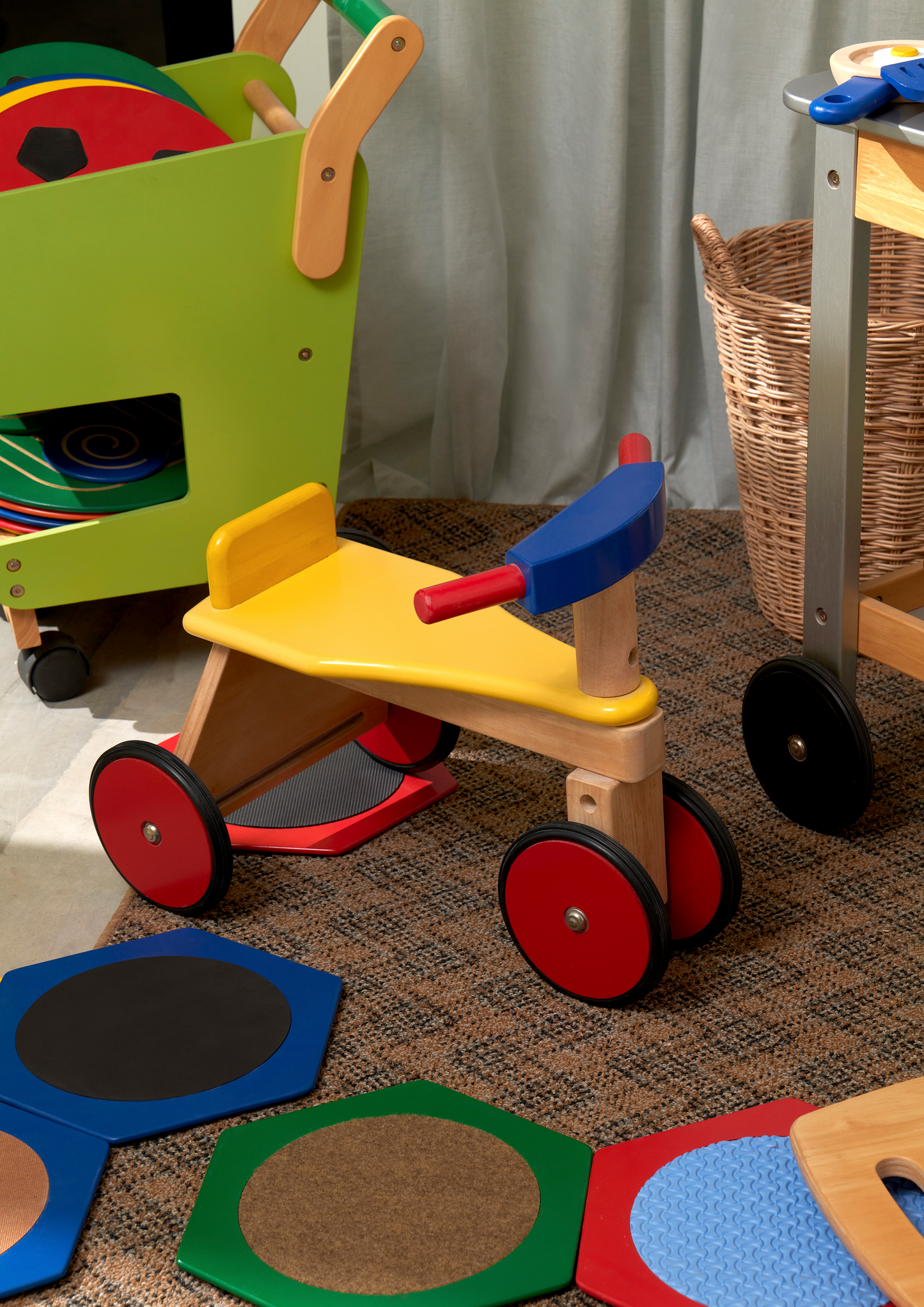 A set of colorful tactile stepping stones with different textures for children's play.