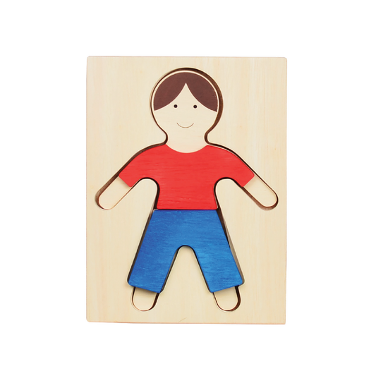 A wooden puzzle in the shape of a boy figure with two layers of shapes, one in red and one in blue.