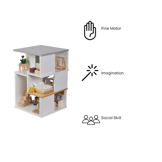A two-story white dollhouse with furniture and dolls, featuring a modern design with a kitchenette and a bedroom on the upper floor.