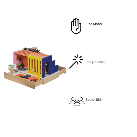 A colorful wooden dollhouse with a red, blue, and yellow facade, containing a doll and some accessories.
