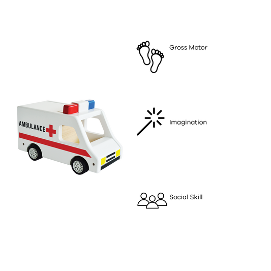 A toy ambulance with a doll inside, featuring red and white colors with the text 'AMBULANCE' on the side.