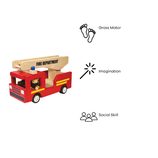 A red wooden fire truck toy with a blue light on the top, featuring a yellow ladder and black text 'FIRE DEPARTMENT', and two dolls inside.