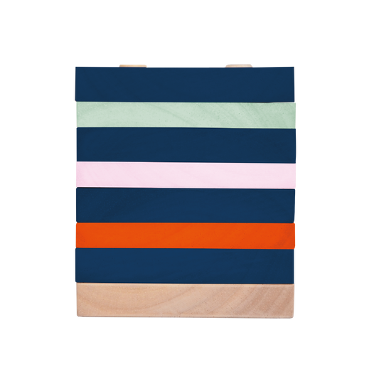 A colorful educational toy consisting of a series of horizontal stripes in various colors on a wooden surface.