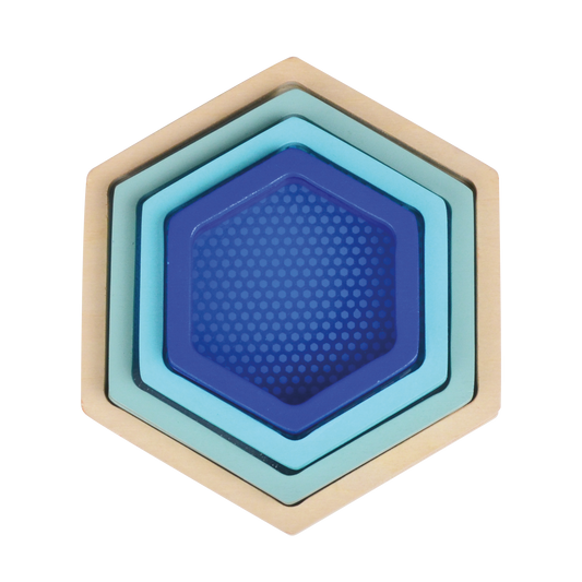 A set of hexagon-shaped stacking rings in shades of blue and beige.