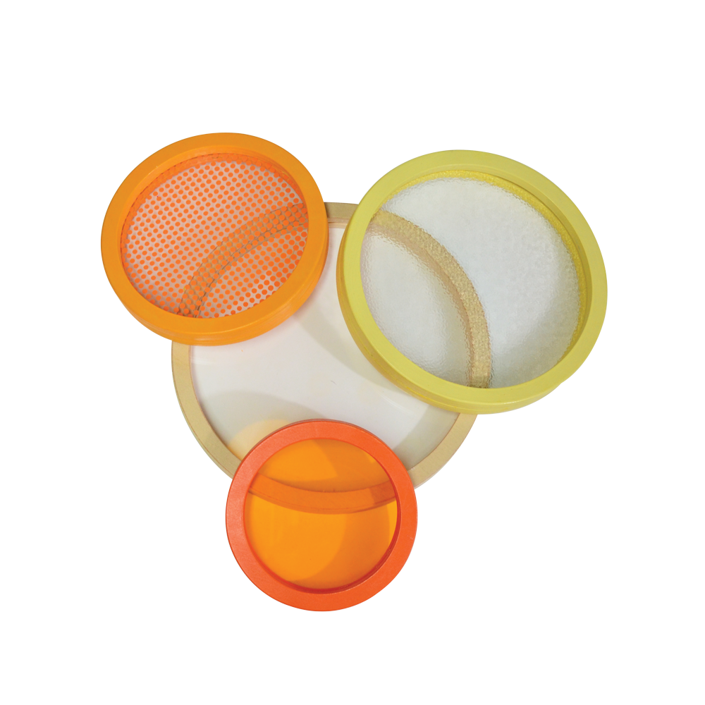 A colorful circular toy with a patterned acrylic insert and a yellow border.