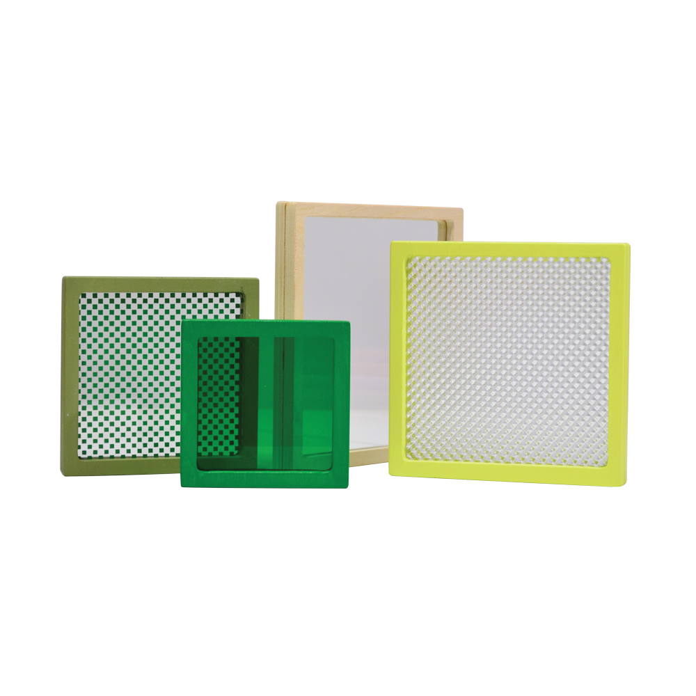 A multicolored geometric toy consisting of a square disc with different colors and patterns on each side, presented on a light background.