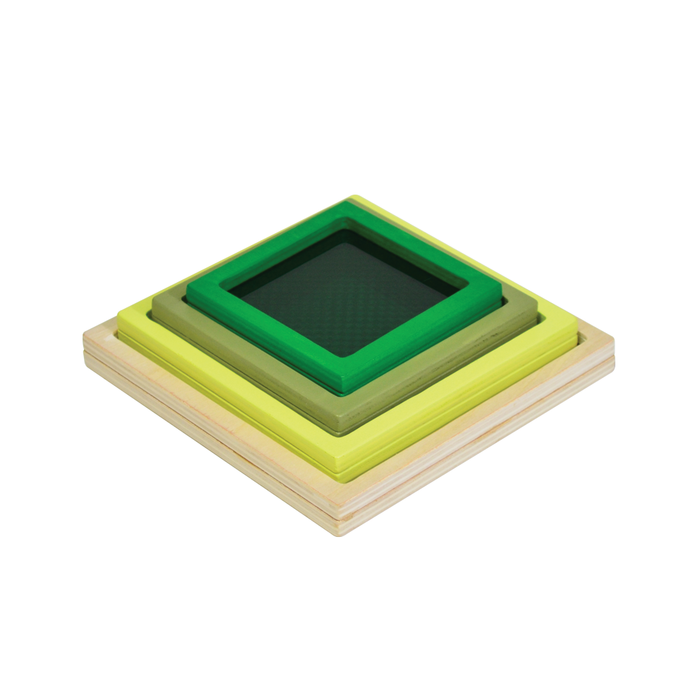 A multicolored geometric toy consisting of a square disc with different colors and patterns on each side, presented on a light background.