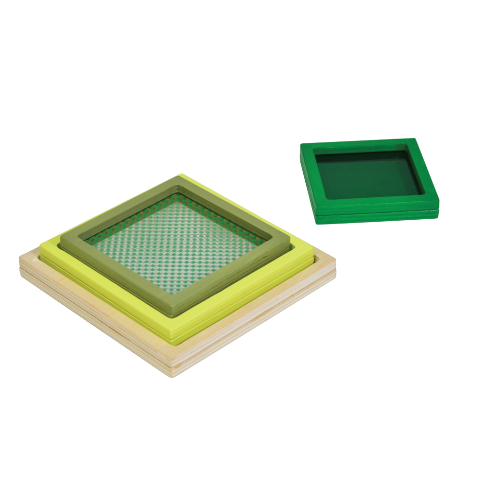 A multicolored geometric toy consisting of a square disc with different colors and patterns on each side, presented on a light background.