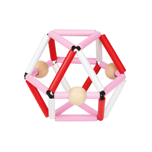 Lightweight wooden polyhedron baby toy with pink dowels and colored beads that slide along elastic ties, designed for grasping, squeezing, and sensory play.