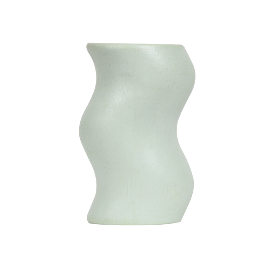 A white, irregularly shaped kaleidoscope toy.