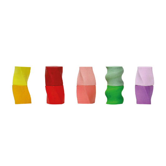 A set of colorful geometric shape sorters in various colors aligned in a row.