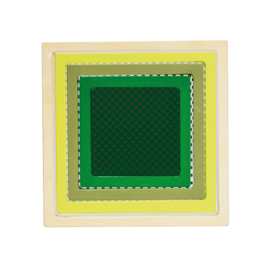 A multicolored geometric toy consisting of a square disc with different colors and patterns on each side, presented on a light background.