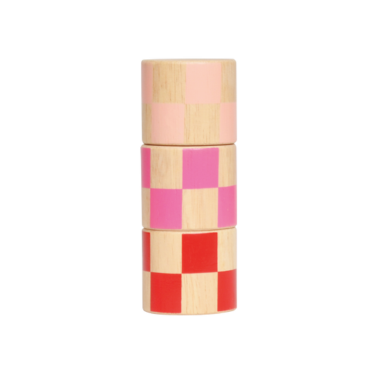 A wooden toy with a series of checkered layers in pink and yellow, designed for young children.