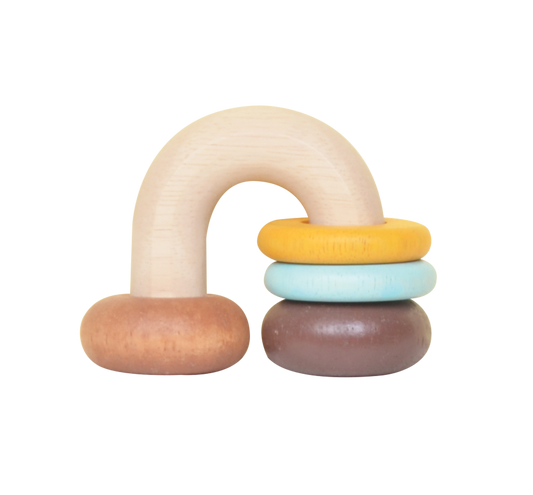 A wooden horse shoe rattle with moving rings in beige, yellow, and brown colors.