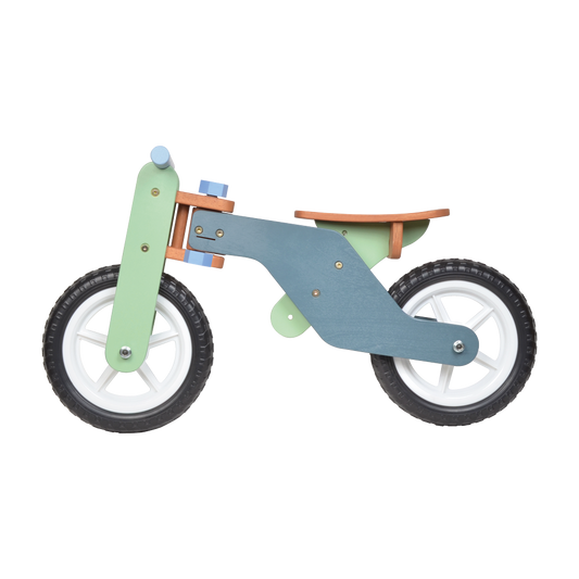 A green and blue toy balance bike designed for toddlers.