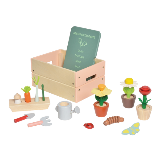 A wooden garden shop playset with various toy plants, pots, gardening tools, and a sign indicating a 'Garden Catalogue'.