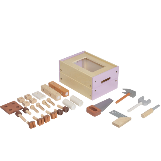 A toy hardware store set including a wooden box with tools and pretend bricks, all in a pastel color scheme.