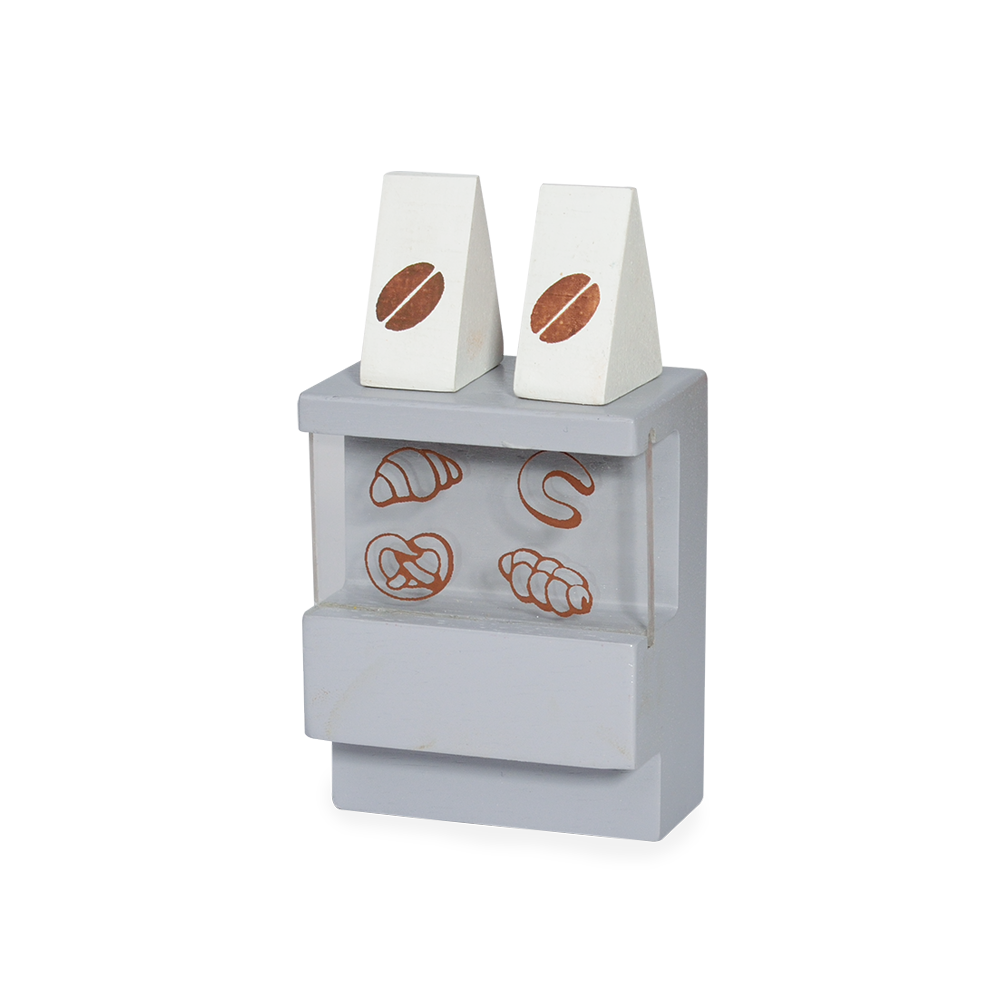 A red toy coffee truck with a swing open serving counter, a green and white coffee machine, and a barista and customer figure in blue and green.