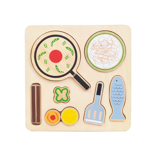 A wooden puzzle game featuring various food-themed pieces such as a pan, spoon, and fish, designed for children to develop fine motor skills and coordination.