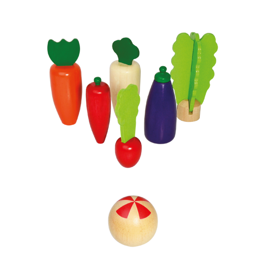 Set of 6 colorful wooden skittles shaped like vegetables, designed for small hands. Includes a cotton storage bag for easy cleanup and storage.