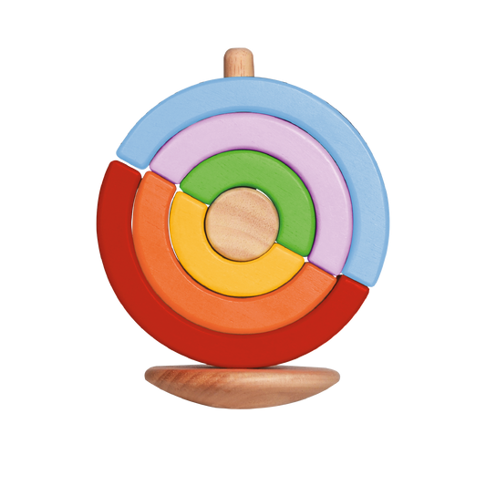 A colorful spinning top made of wooden half-circle pieces, with a natural wood base.