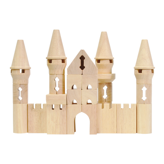 A wooden castle set made up of multiple blocks with intricate designs, resembling a fairytale castle with several towers and a central keep.