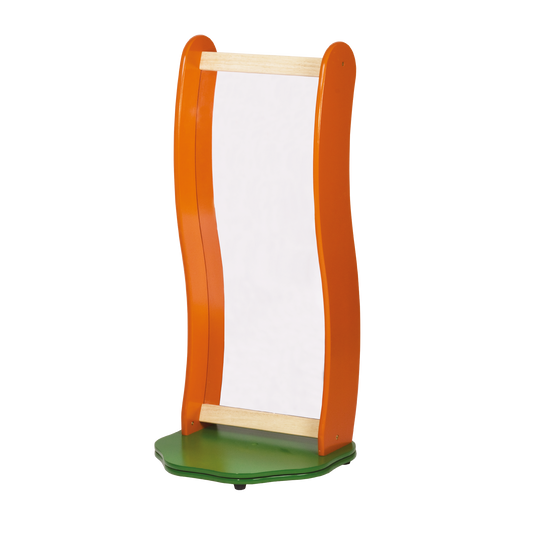 A free-standing wavy mirror with a wooden frame in orange and a green base, designed for children's educational play.