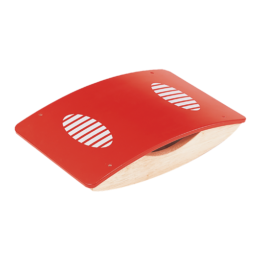A red-colored balance trainer with a flat standing base on one side and a curved base on the other, designed for children's play.