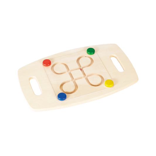 A wooden balance board with multicolored marbles set up on it, designed for young children.
