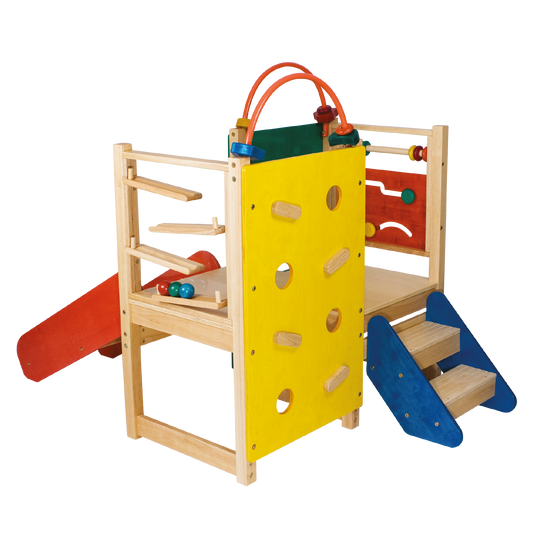 A colorful toddler gym with a wooden structure, red slide, yellow climbing structure, blue abacus, and multicolored rungs and steps.