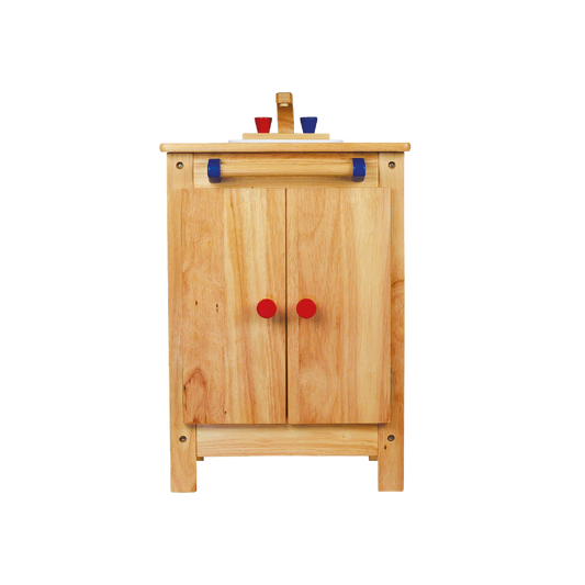 Children's toy sink unit made of wood with a towel rack, sink with faucet, and storage shelf underneath.