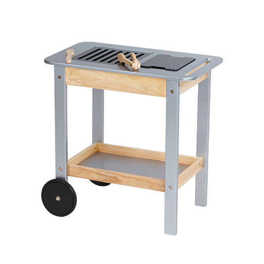 Children's wooden BBQ trolley with metal grill and wheels, equipped with grilling utensils.