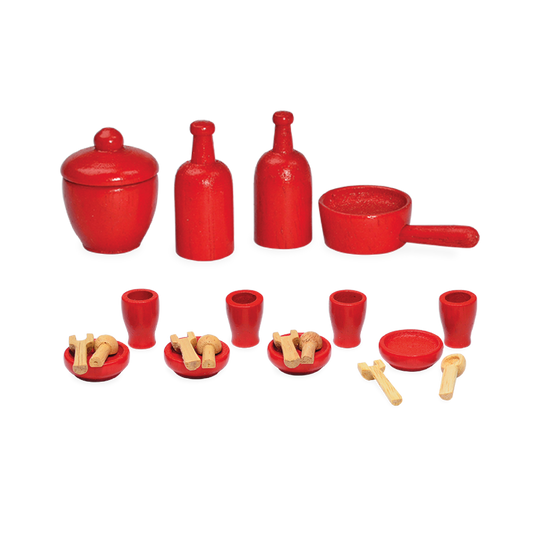 A set of red plastic dining accessories for children, including a cup, a bowl, a plate, and some wooden cutlery pieces.