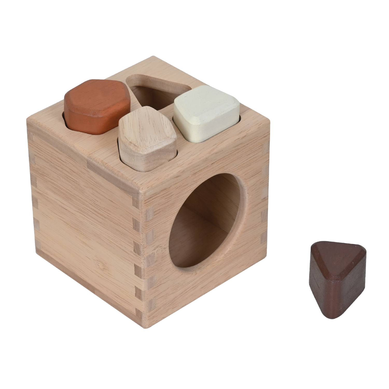 A wooden sound stones sorter box with four colorful irregular shaped pieces inside.